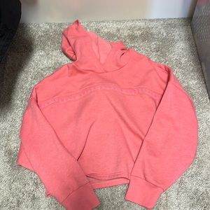 Under Armour women’s pink crop sweatshirt. Size S.